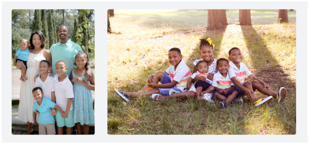 Two young girls holding hands outdoors, one in a blue dress.
